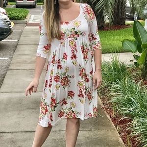 Agnes & Dora Oakley White with Coral Flowers